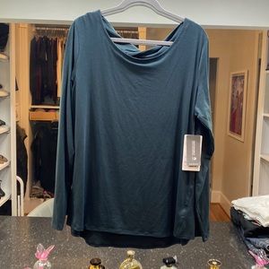 Athlete open back flex light top. X-Large Brand new with tags